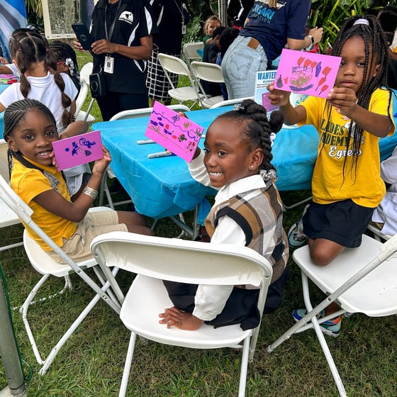 Children with decorated Lagoon Drift cards at Ann Norton Sculpture Gardens' Earth Day Event.