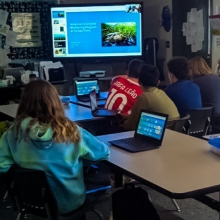 Students watching an Ocean Expert Exchange livestream during the spring 2025 semester.
